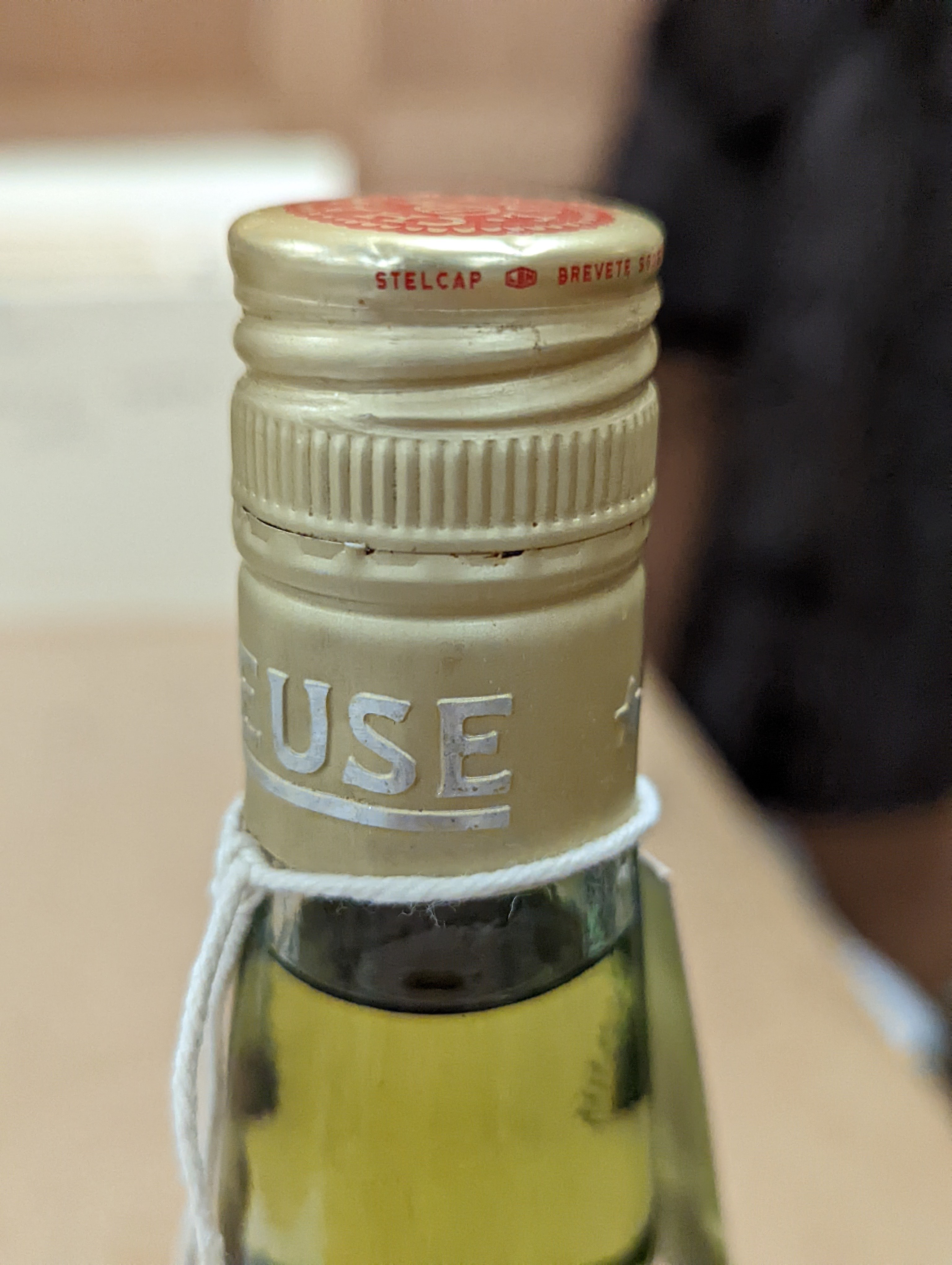 One Chartreuse bottle and ten Chartreuse miniatures